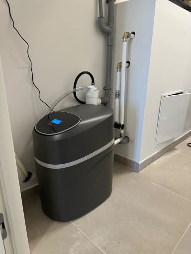 Adoucisseur d'eau volumétrique compact 